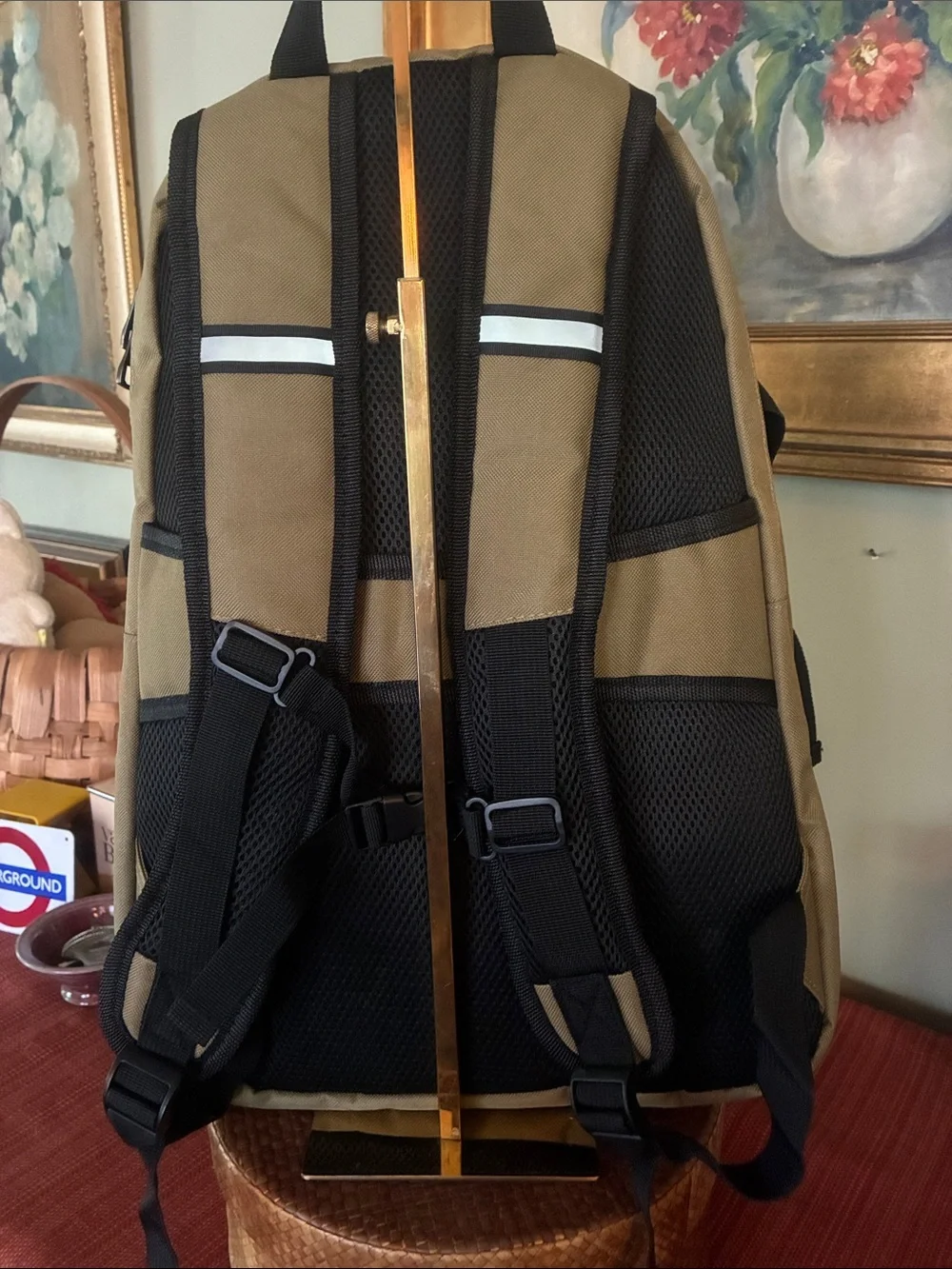 NRA Tactical Backpack Multi-Pocket in tan with black accent panels, EST 1871